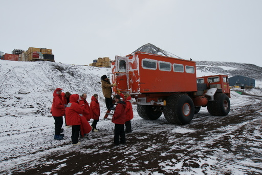 Ten of us on the Happy Camper snow school board a Delta transport vehicle for the 30 minute ride to the camping site. (click to enlarge)