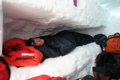 Another view of the snow trench, showing Campbell after having slept there all night. (click to enlarge)