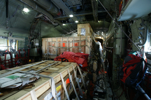 Inside the LC-130, most of the space packed with cargo, a lot of which was ours. (click to enlarge)
