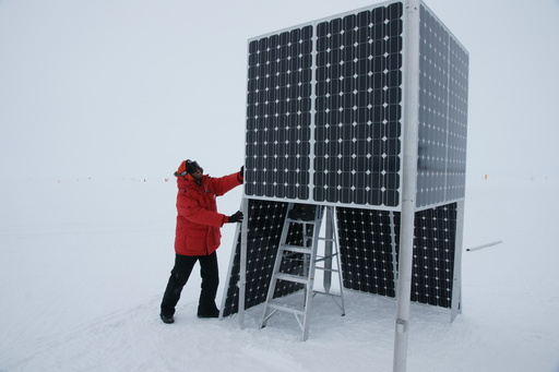 Luke assembling the solar panel cube. Campbell is inside on the ladder. (click to enlarge)