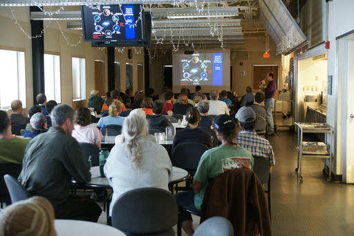 Craig starting off our South Pole weekly science lecture in the galley. (click to enlarge)