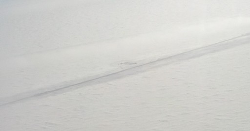 The PLATO-R/HEAT observatory (the smudge of structures in the centre, above the skiway) from the air. CREDIT: Campbell McLaren. (click to enlarge)