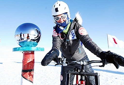 A photo of Helen Skelton from the BBC website. That\'s me (the straight red figure second from the left) reflected in the shiny sphere. (click to enlarge)